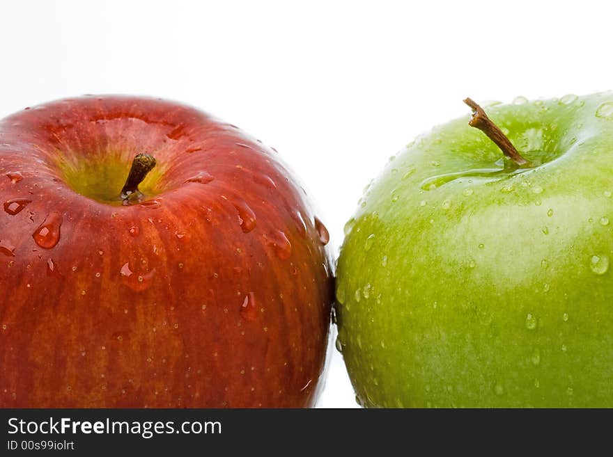 Two wet apples with white background