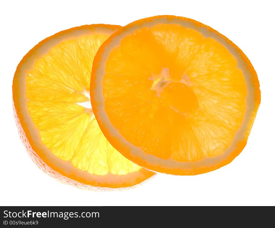 Two slices of orange isolated on white