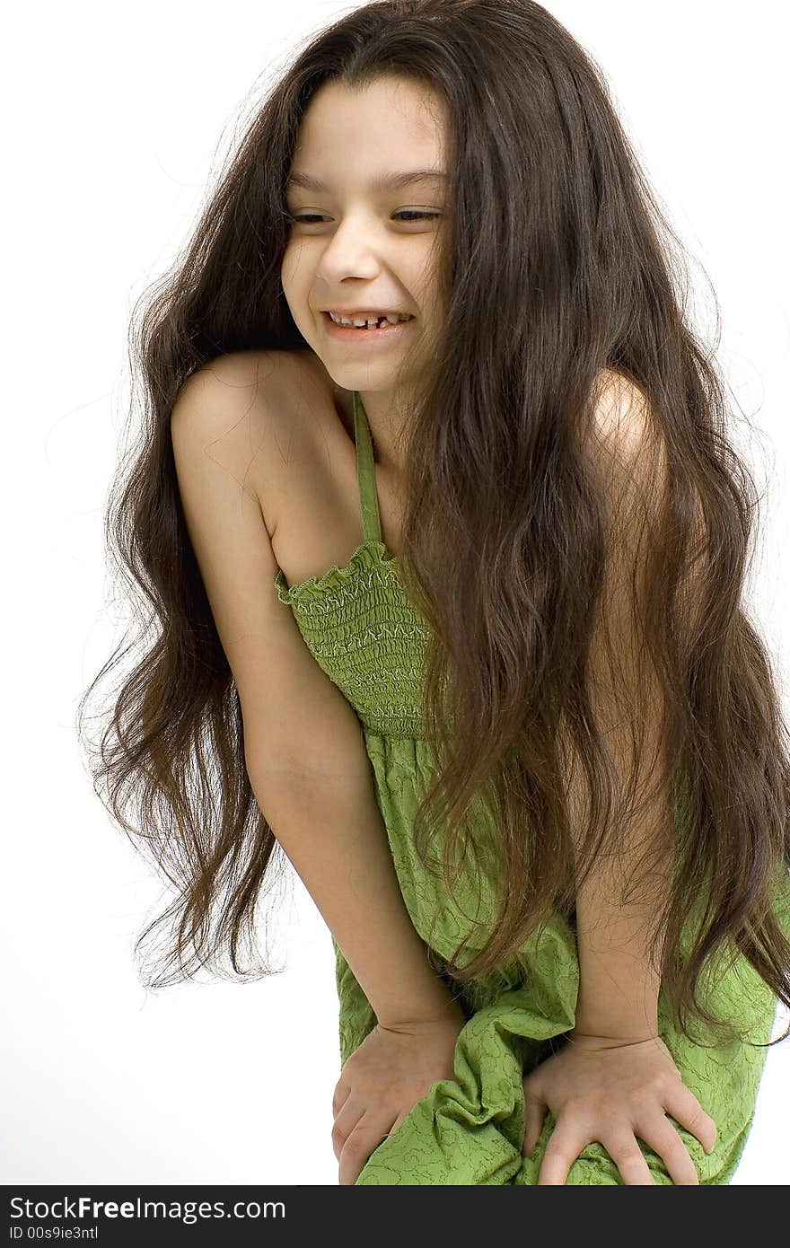 Young girl posing on a white background.