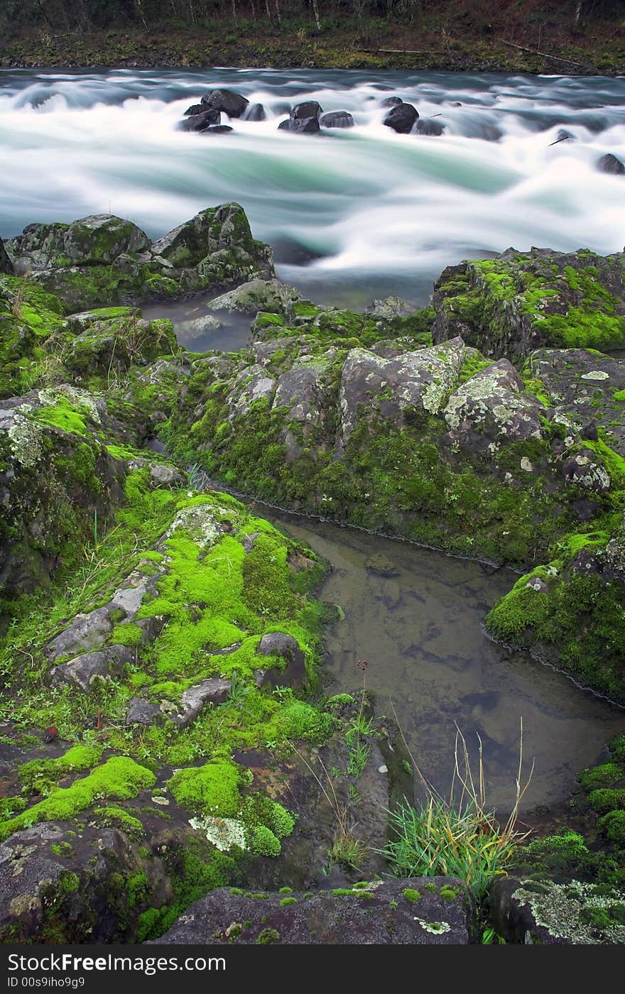 Water cascades through a valley creek. Water cascades through a valley creek