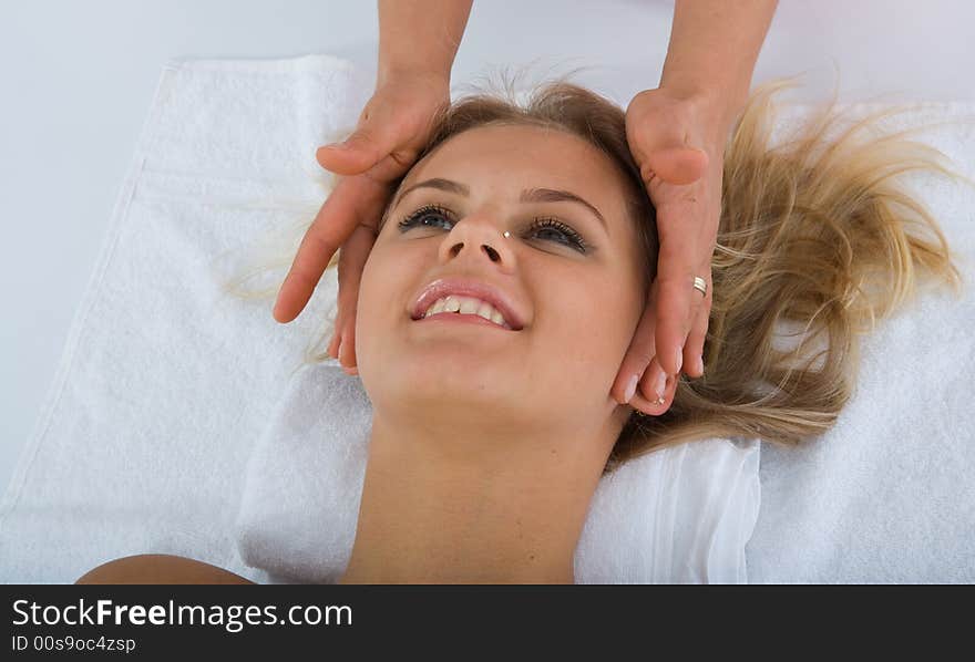 Facial massage to the girl