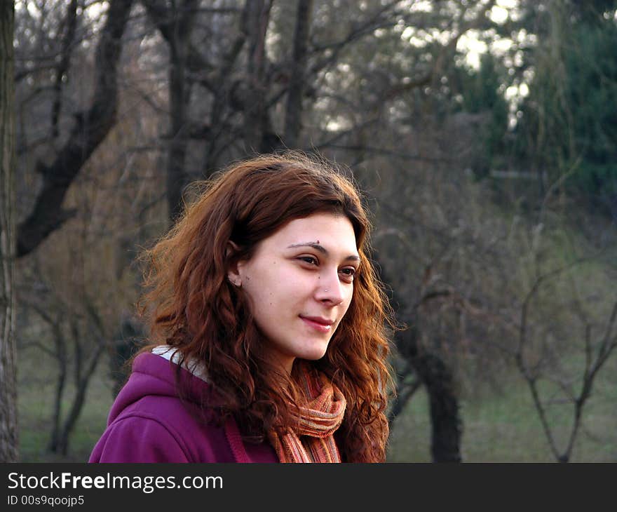 Portrait of a beautiful girl in a park. Portrait of a beautiful girl in a park