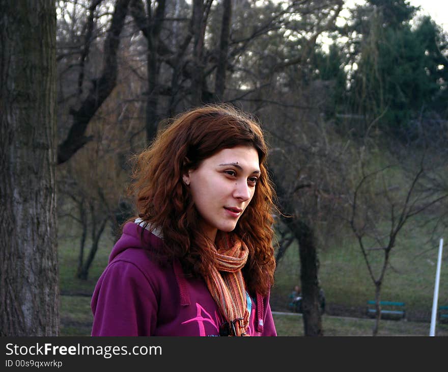 Portrait of a beautiful girl in a park