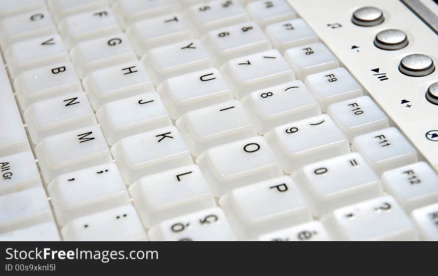 White computer keyboard. White computer keyboard