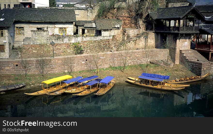 Many china traditional boats on the river.Hunan province,China.