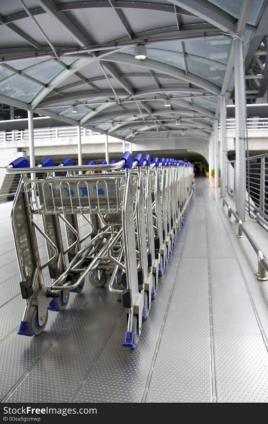 Airport Carts on walkway at Terminal Building