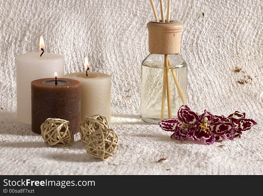 Aroma therapy objects. bottle of esential oil, candles, bath - salt, orchid. Aroma therapy objects. bottle of esential oil, candles, bath - salt, orchid