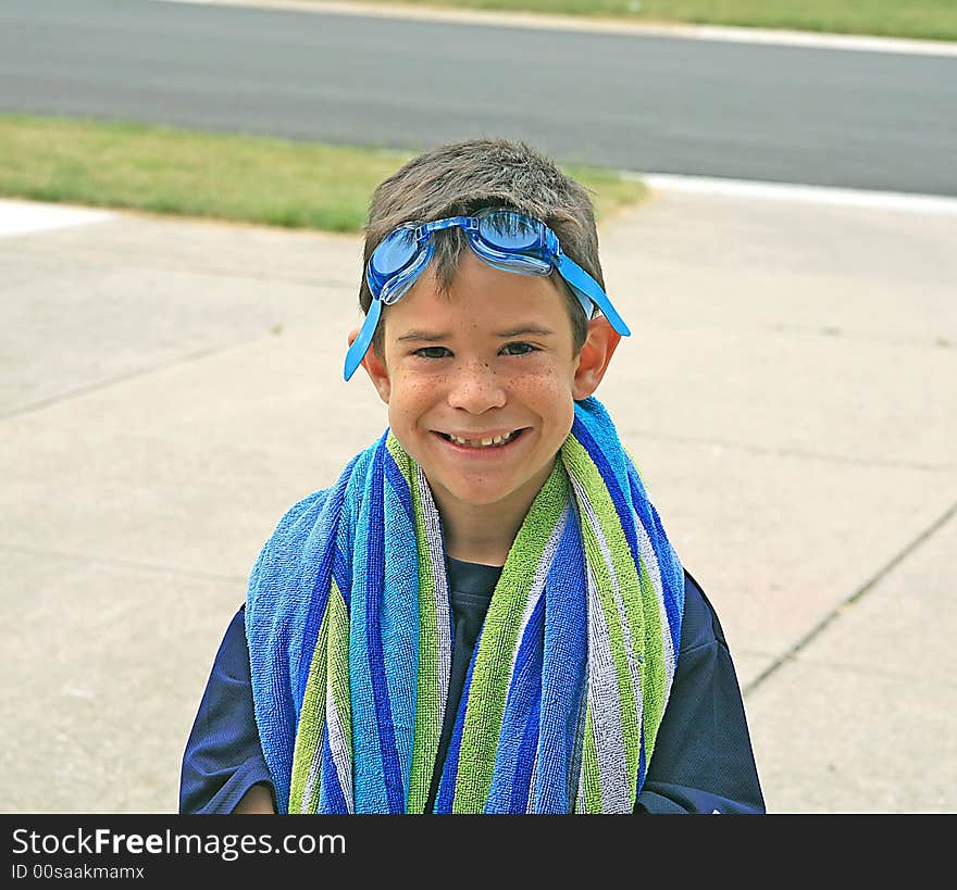 Boy Ready for Swimming With Beach Towel. Boy Ready for Swimming With Beach Towel