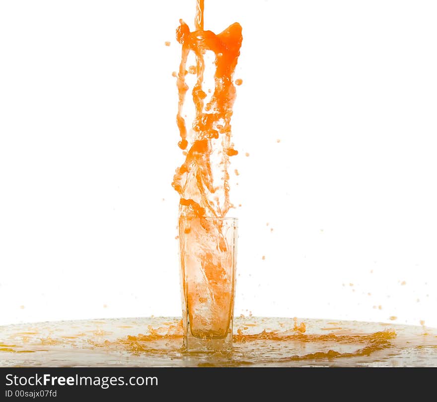 Splashing orange juice on white background. Splashing orange juice on white background