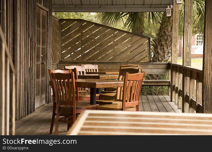 An outdoor patio with seating at a casual restaurant. An outdoor patio with seating at a casual restaurant