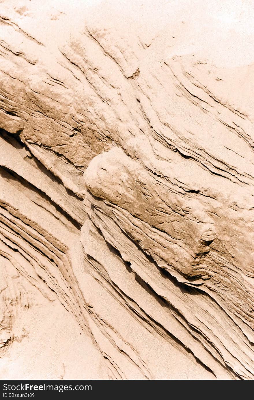 Closeup of a sandbar with sediments