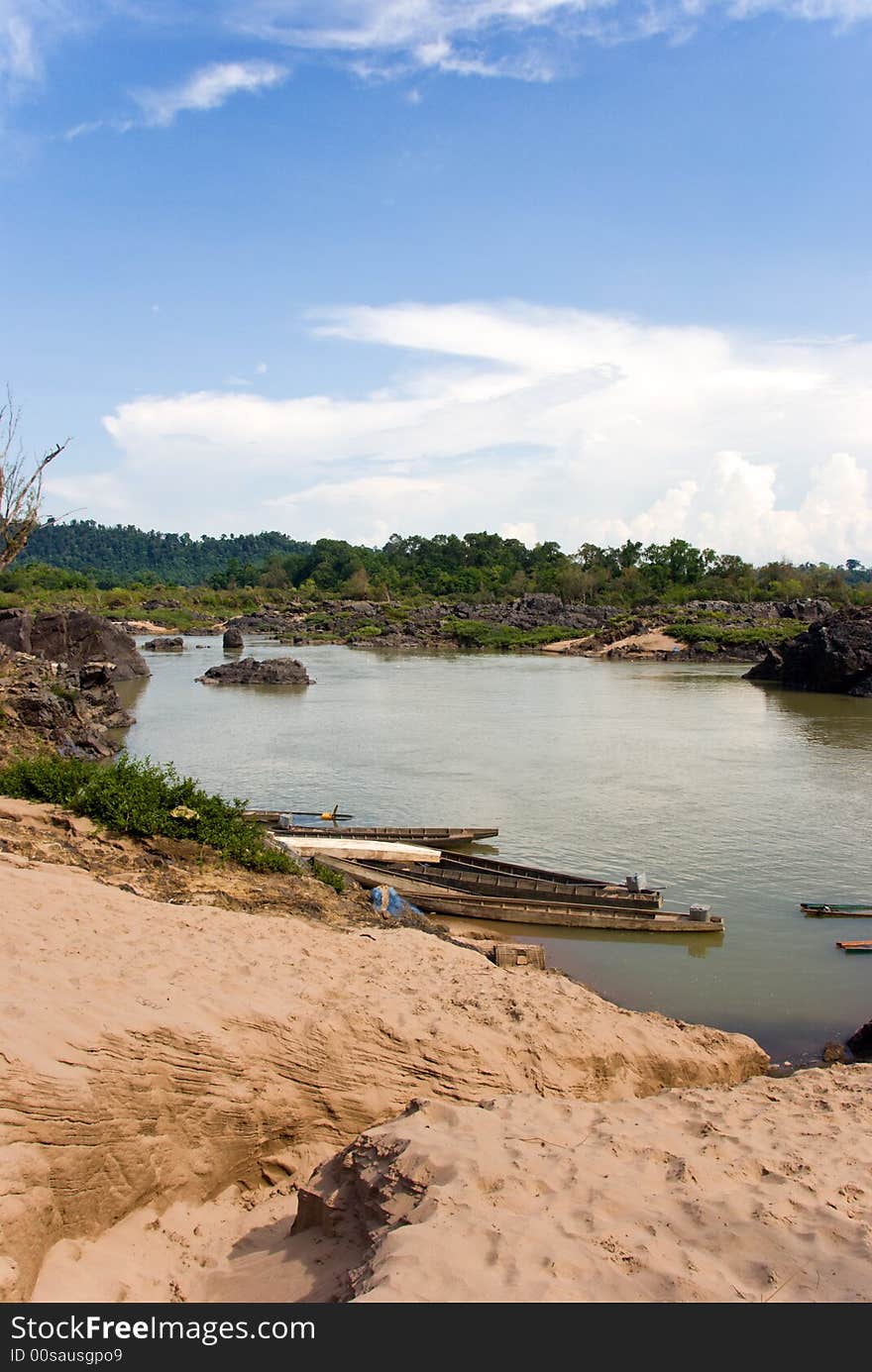 Jungle river with some small canoes