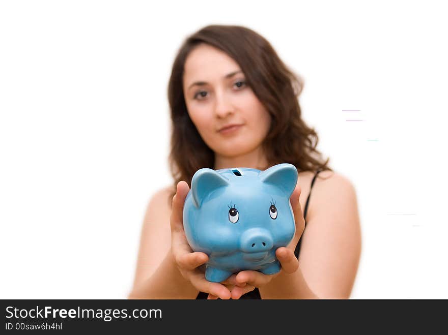 A young attractive woman with blue piggy-bank. A young attractive woman with blue piggy-bank