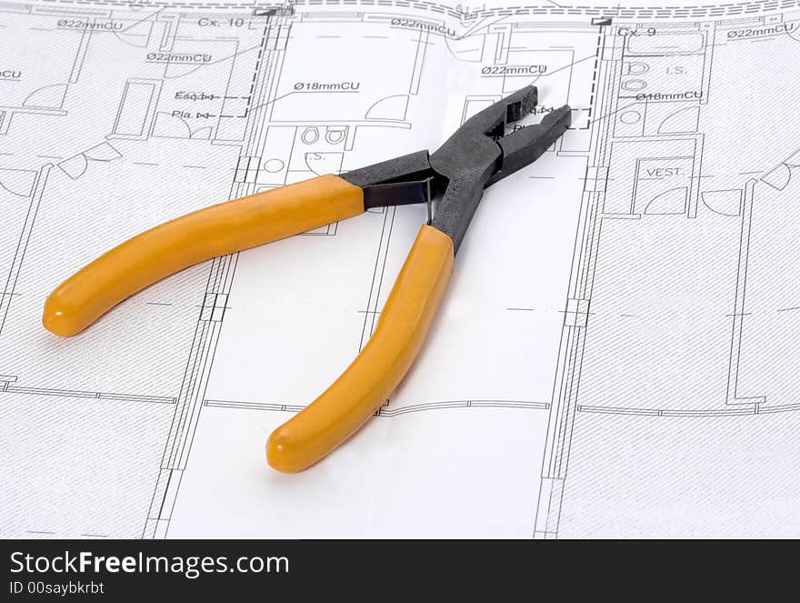 Pliers and house plan for construction or reconstruction