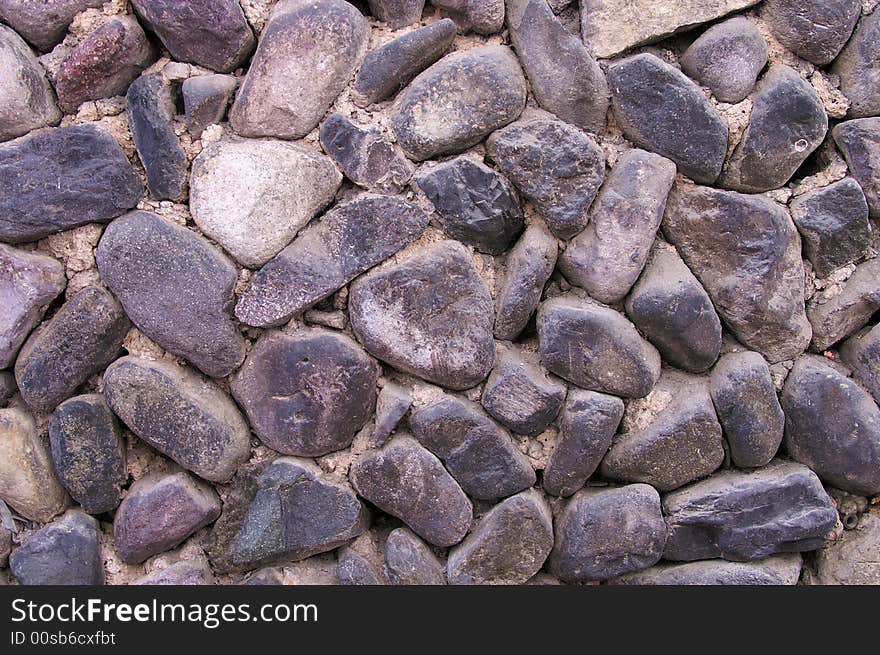 An old stone wall in a chinese village