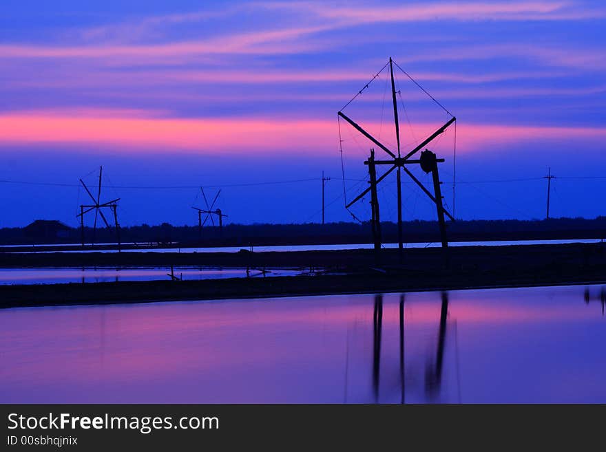 Before sunrise at the salt field in Samutsakorn Thailand. Before sunrise at the salt field in Samutsakorn Thailand.