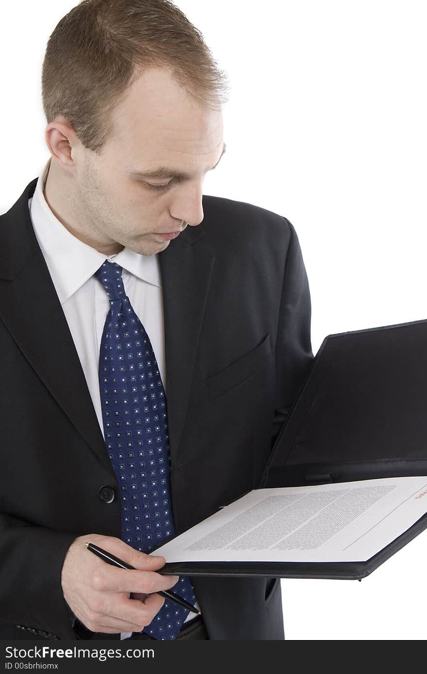 Businessman while checking of important documents. Businessman while checking of important documents