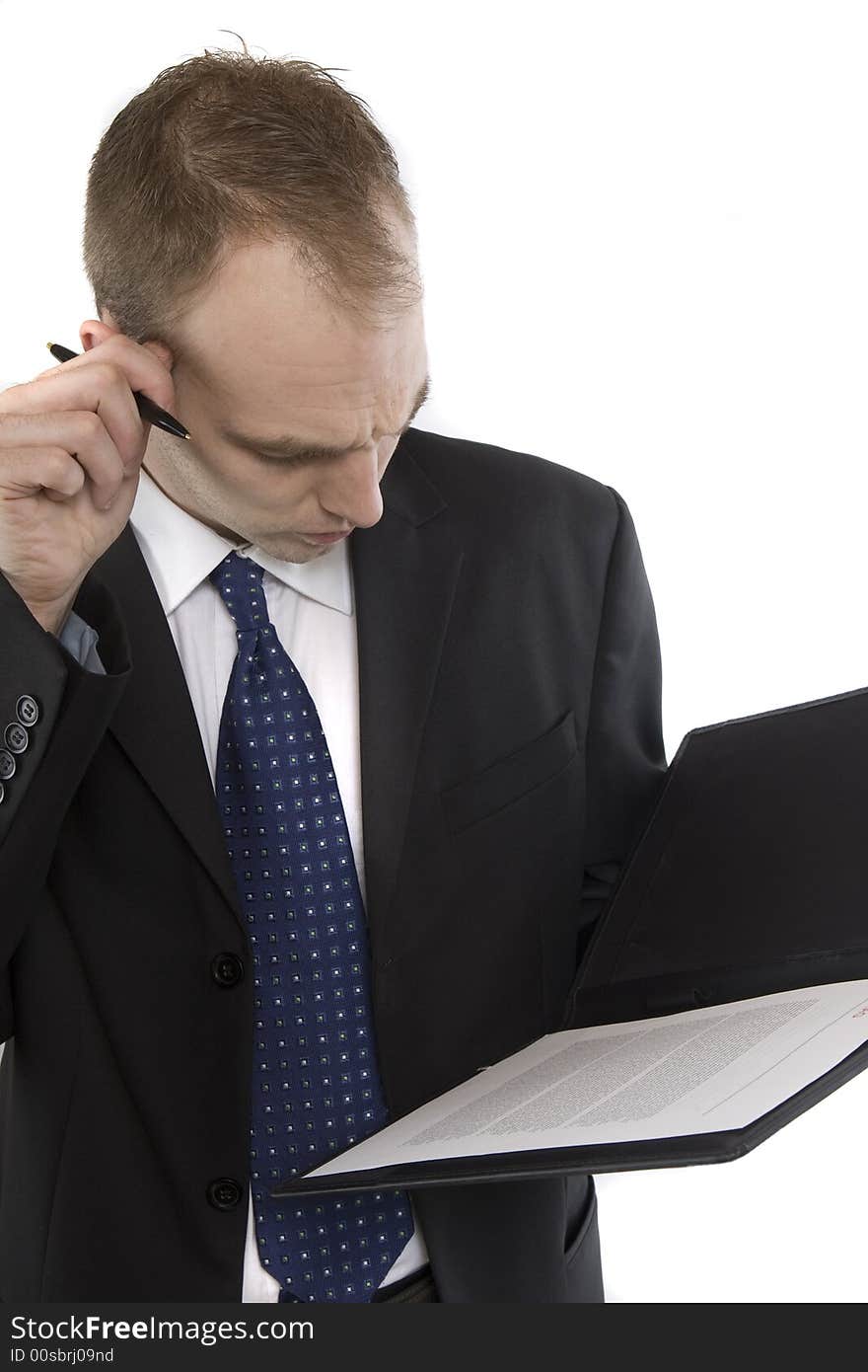 Businessman while checking of important documents. Businessman while checking of important documents