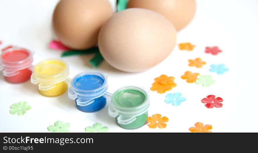 Paints and decorations ready for making easter eggs. Paints and decorations ready for making easter eggs