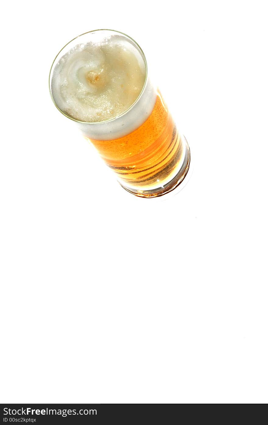 Beer in glass on white background