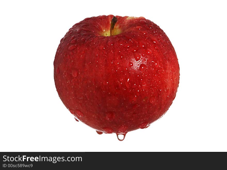 Red apple with drops of water free-standing, isolated on white