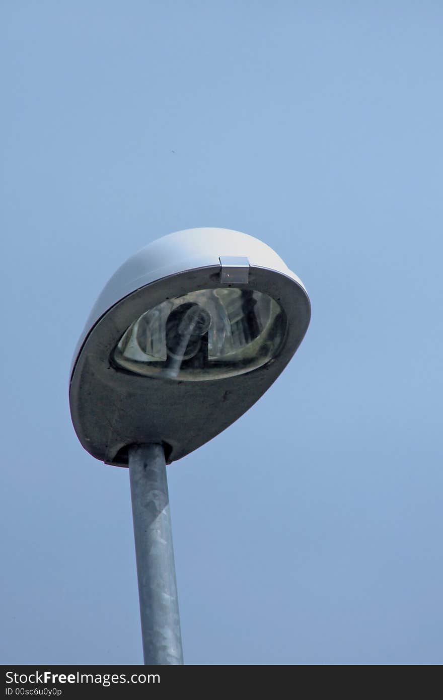 Street lamp, top end on the clear blue sky background (with space for text)