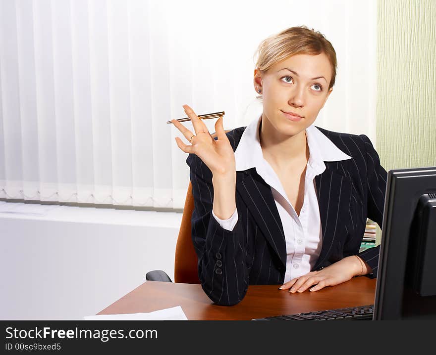 The business woman in an office