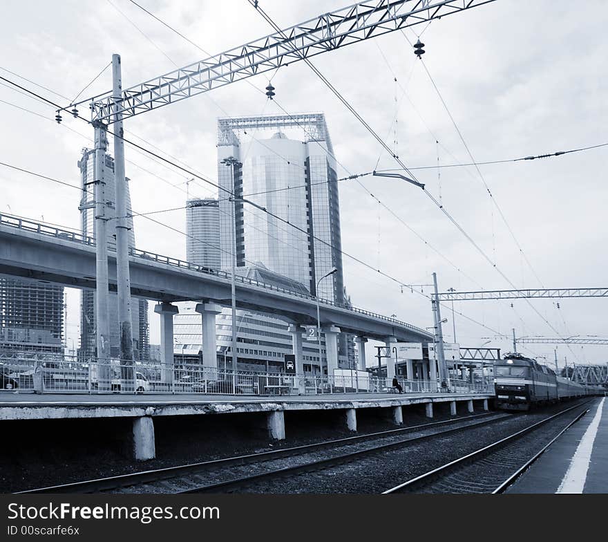 Railway platform, road and offices building toned. Railway platform, road and offices building toned.