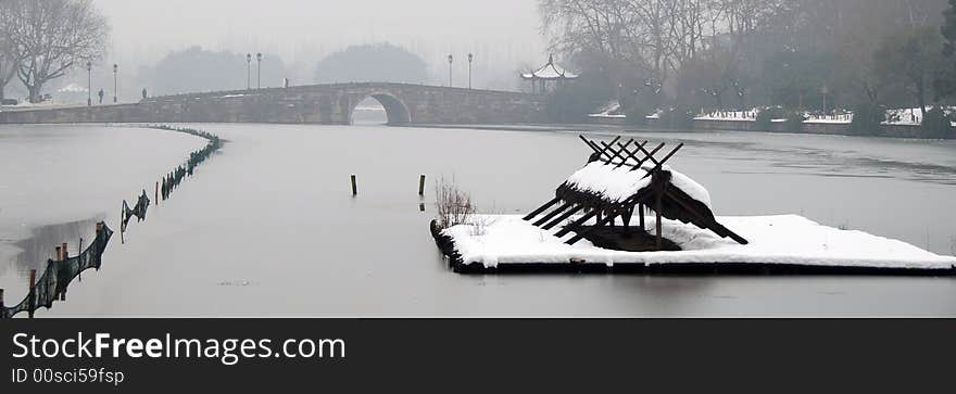 After a very heavy snow, the west-lake(in Hangzhou,China) looks beautiful. After a very heavy snow, the west-lake(in Hangzhou,China) looks beautiful