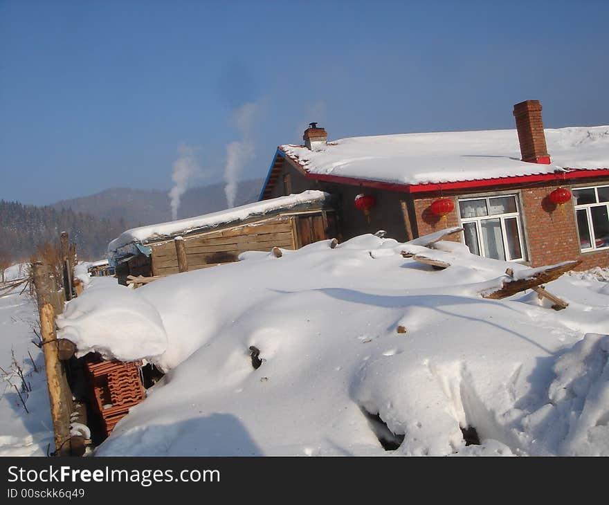 A chinese house in the snow forest near Shen-Yang, a city in northeastern China