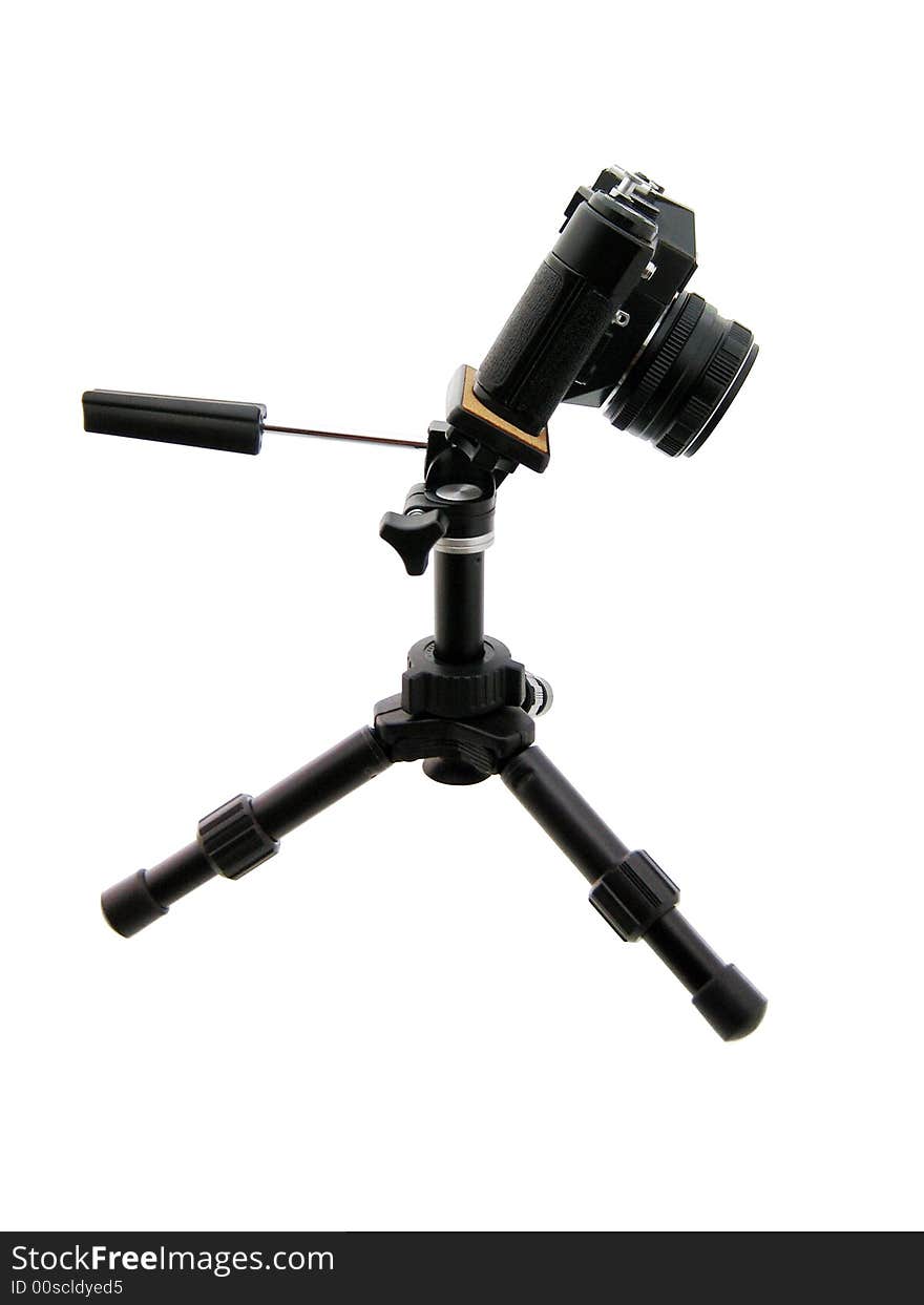 Photographing . Black tripod and camera