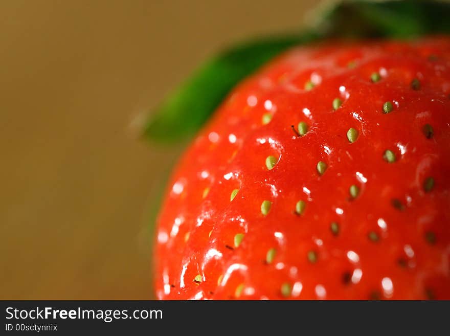 Strawberry with a brown background