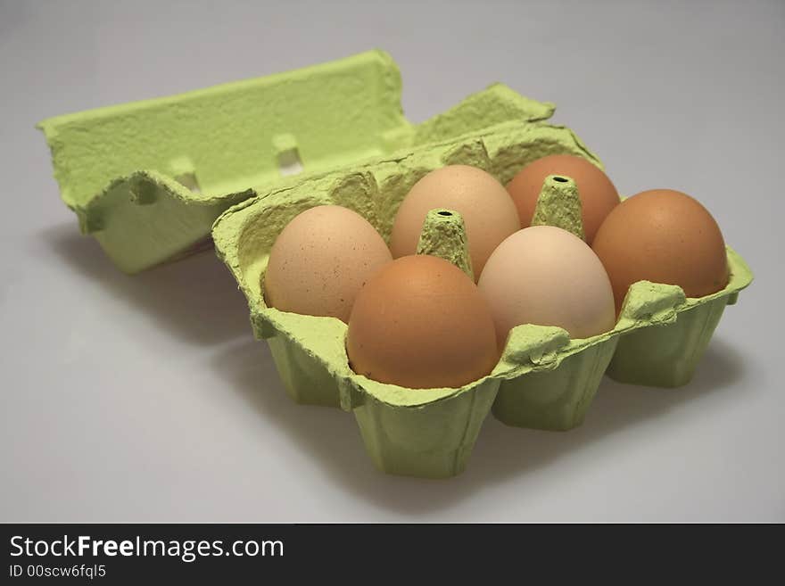 Eggs in an egg box.