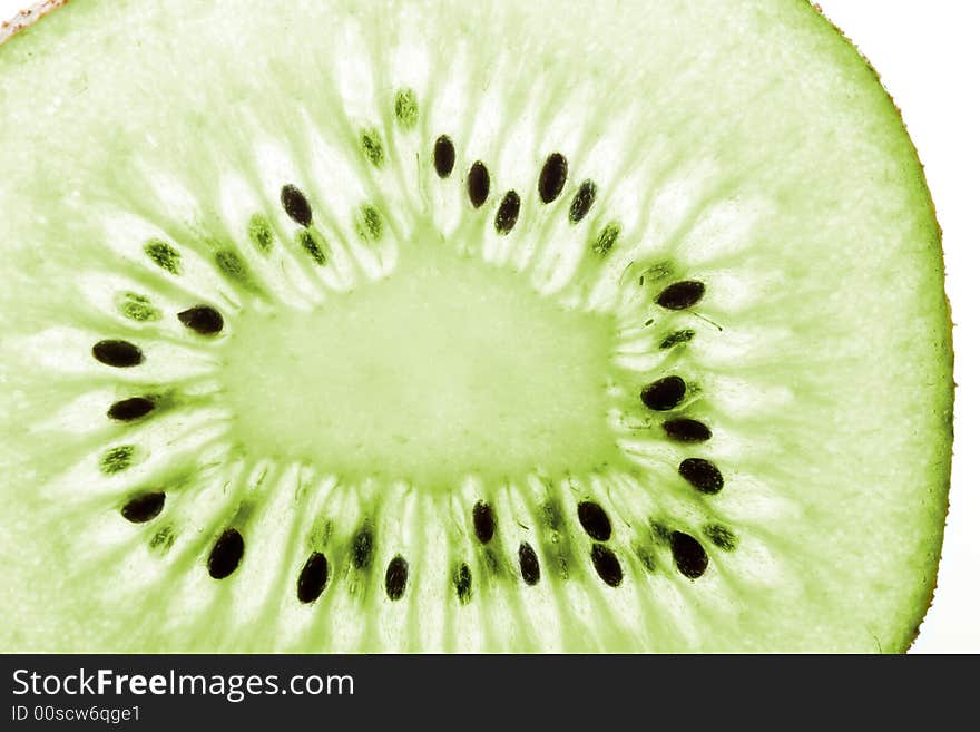 Macro slim tranperent slice of fresh kiwi