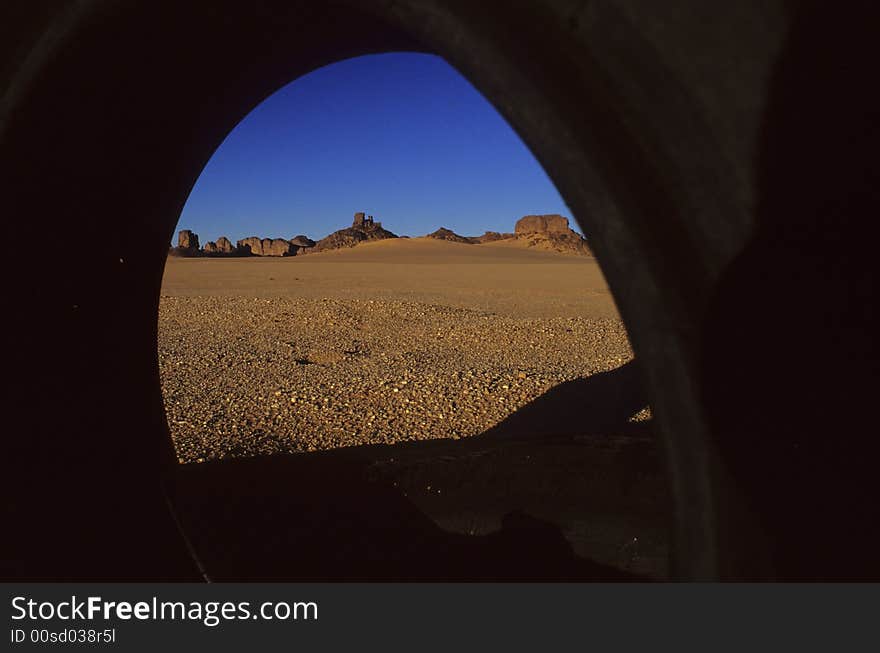 Tires at the roadside of an Algerian desert piste. Tires at the roadside of an Algerian desert piste