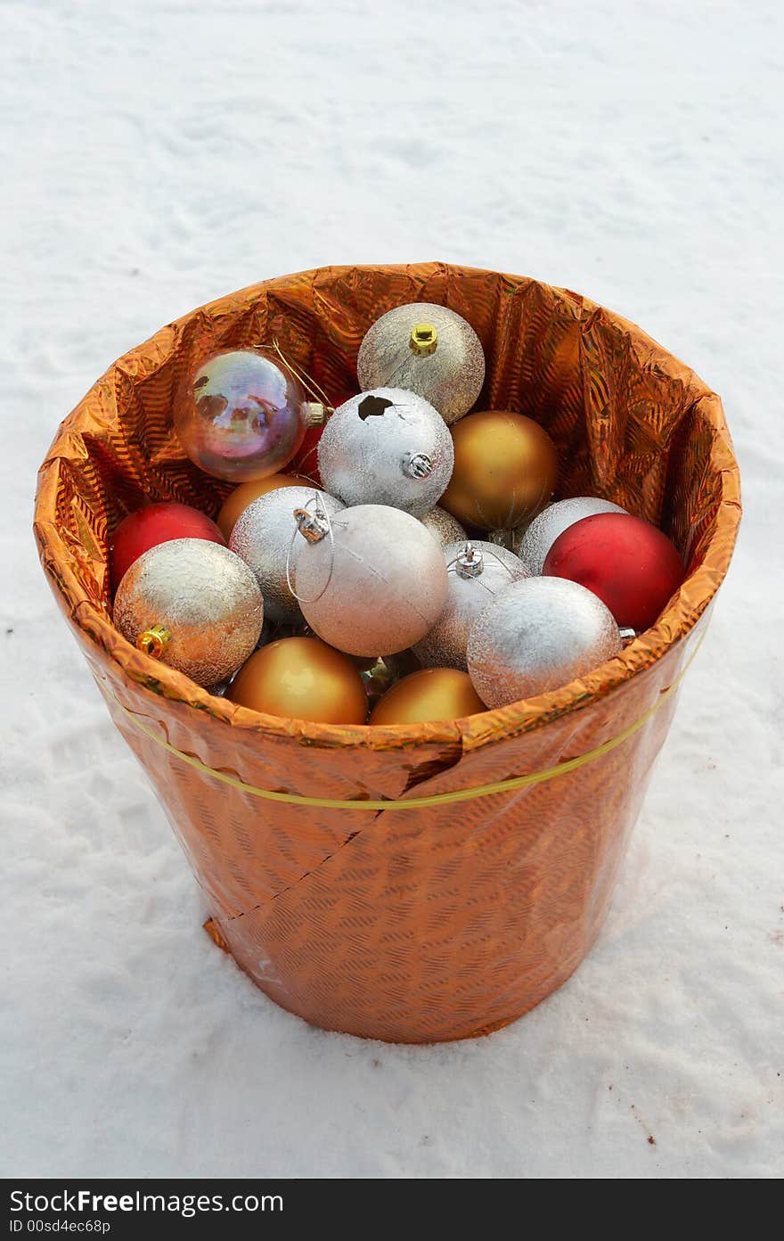 The bucket filled by christmas-tree decorations. The bucket filled by christmas-tree decorations