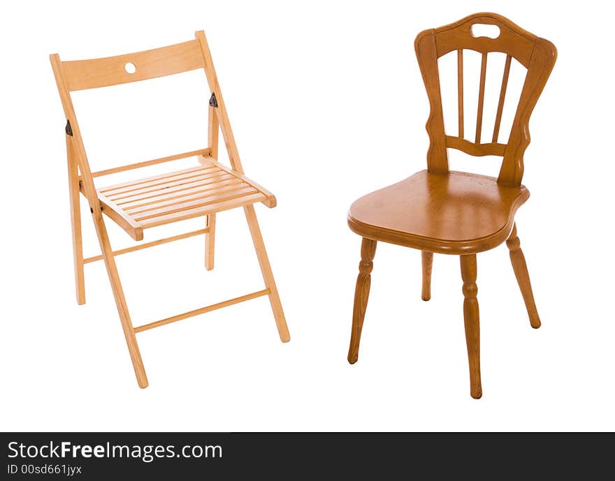 Two wooden chairs isolated on a white