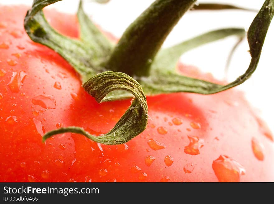 A part of red fresh tomato. A part of red fresh tomato