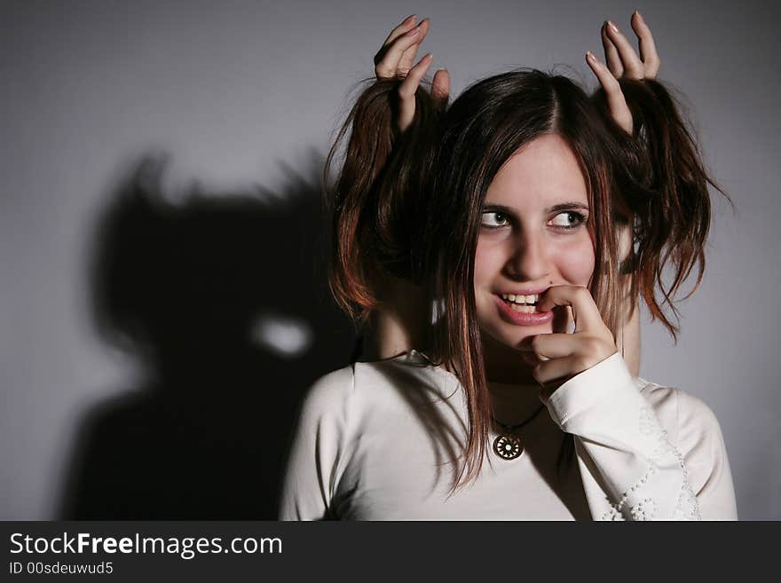 Photo of a young girl with demonic smile. Photo of a young girl with demonic smile