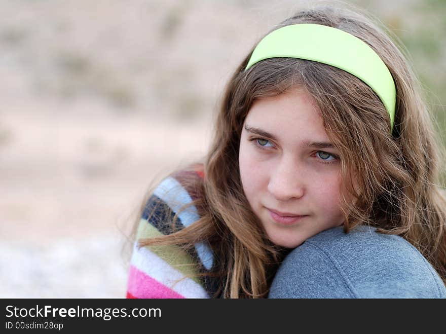 Young and happy girl is enjoying herself outdoors. Young and happy girl is enjoying herself outdoors