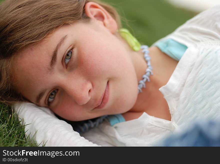 Young and happy girl is enjoying herself outdoors. Young and happy girl is enjoying herself outdoors