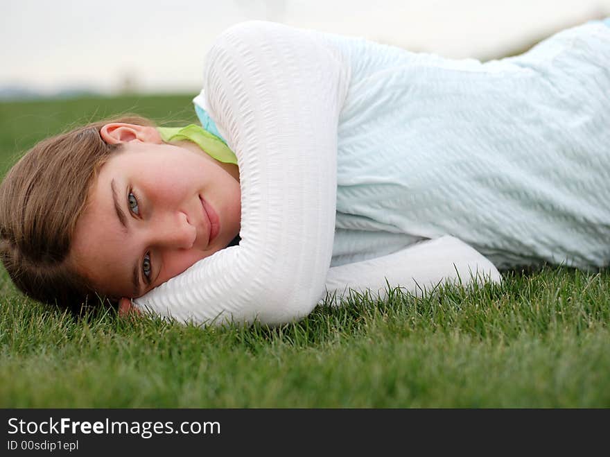 Young and happy girl is enjoying herself outdoors. Young and happy girl is enjoying herself outdoors