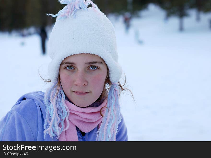 Young girl is playing in the snow. Young girl is playing in the snow