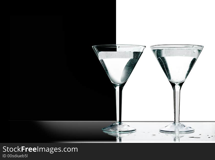 Two black-and-white glasses for martini