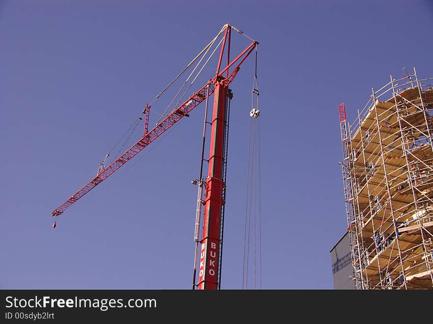 A crane in front of the Corpus building in Leiden, the Netherlands, under construction. A crane in front of the Corpus building in Leiden, the Netherlands, under construction