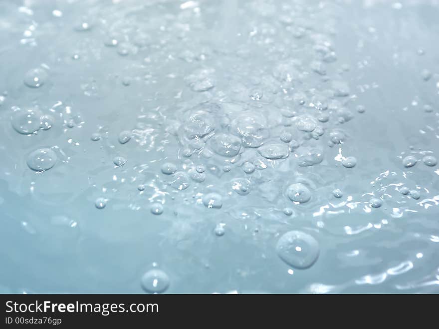 Background made of closeup on some bubbles at water. Background made of closeup on some bubbles at water