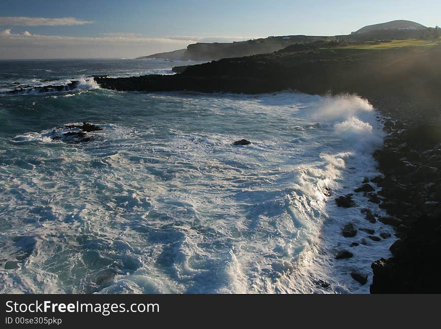 Ocean coast with surf waves. Canary Islands. Ocean coast with surf waves. Canary Islands