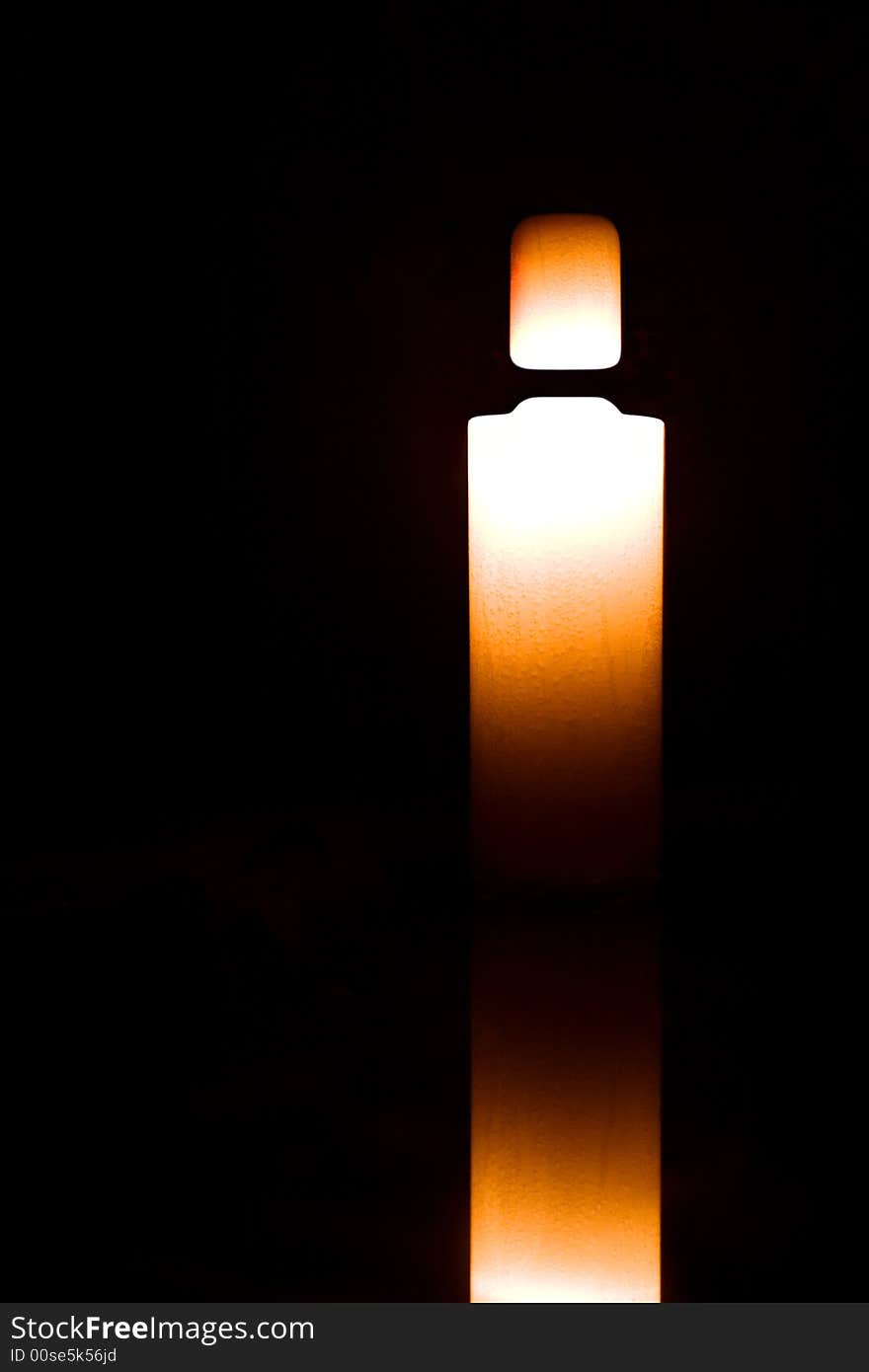 Light Candle Isolated On Black