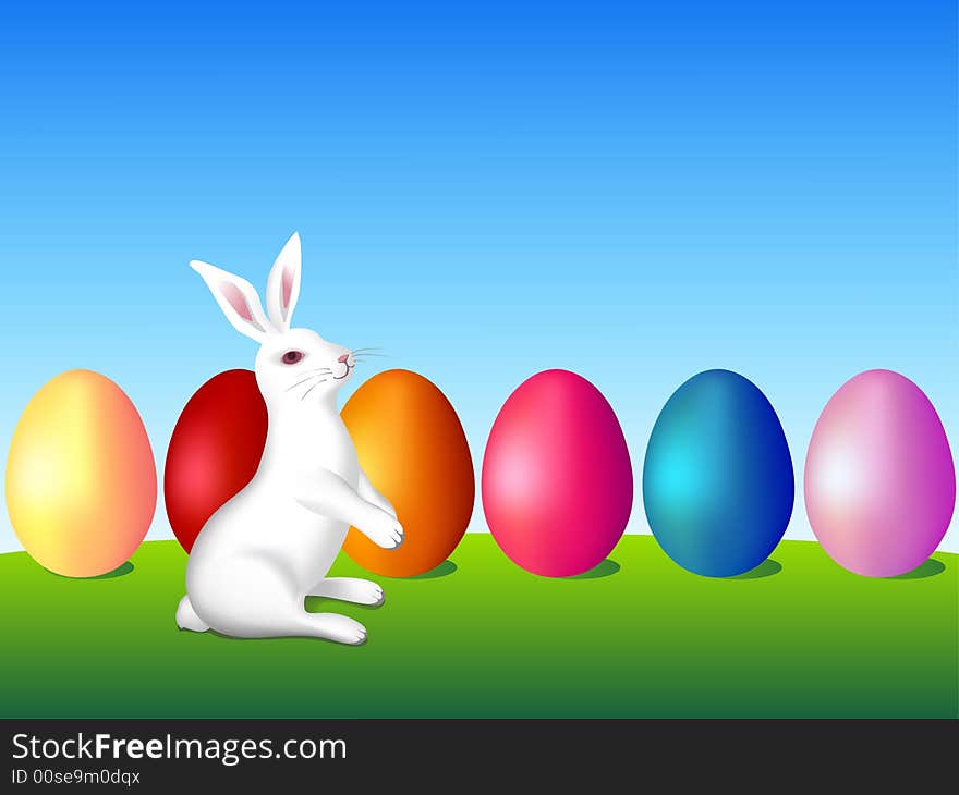 Clip-art of Easter eggs and rabbit in green field.