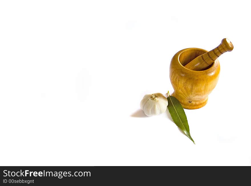 Mortar garlic green leaf on white background. Mortar garlic green leaf on white background